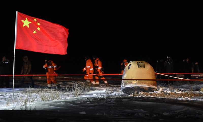 The return capsule of China's Chang'e-5 probe lands in Siziwang Banner, north China's Inner Mongolia Autonomous Region, on Dec. 17, 2020.(Photo: Xinhua)