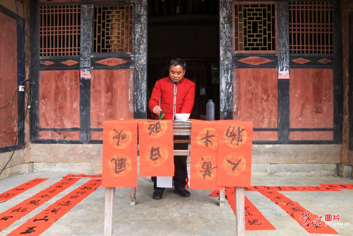 Local family in a traditional village celebrating Lunar New Year