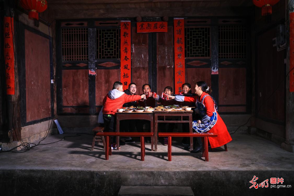Local family in a traditional village celebrating Lunar New Year